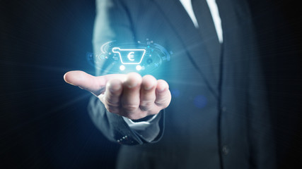 businessman hand holding a virtual shopping cart