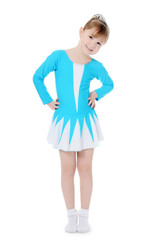 Little girl the gymnast does exercise