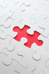 Fototapeta premium puzzle with missing red piece