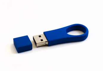 Blue USB drive with cap on white