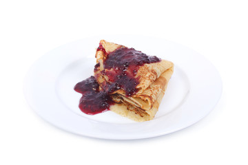Pancakes with jam isolated on white background