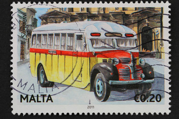 Malta - circa 2011;stamp shows traditional classic Maltese bus