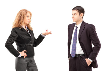Mature female in a formal wear having a conversation with a youn