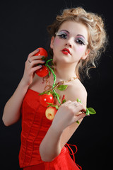 girl in a red dress with bright make-up