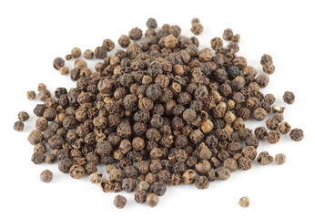 Heap or black pepper isolated on white