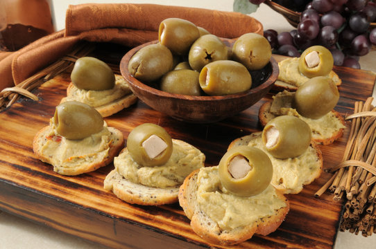 Hummus with green olives and feta cheese