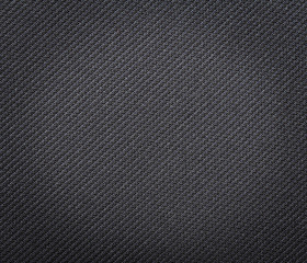 Fototapeta na wymiar Black fabric texture. Clothes background. Close up