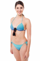 Obraz premium Hot young smiling babe in bikini