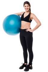 Fototapeta premium Fitness woman with big blue exercise ball