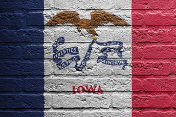 Brick wall with a painting of a flag, Iowa