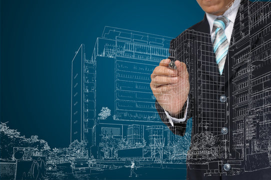 Business Man draw building and cityscape