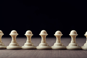 white chess pawns