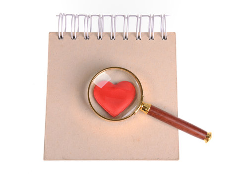 magnifying glass,red hearts and sticky note