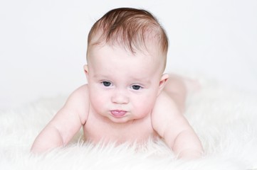 The upset five-months baby