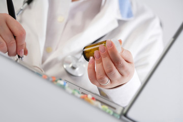 Doctor writing a prescription
