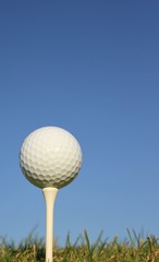 A golf ball with blue sky