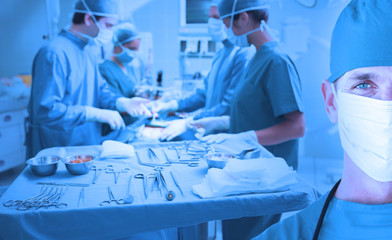 Side view of a medical team operating