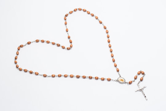 Rosary beads in a heart shape