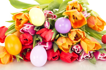 Fototapeta na wymiar Bunch of tulips with easter eggs