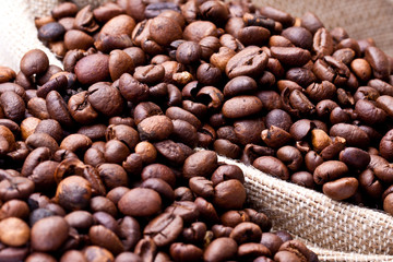 cup of coffee on a background coffee beans 