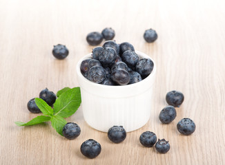 Fresh raw blueberries isolated on white