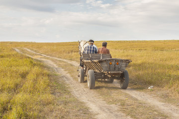 Two man on old cart - Ukraine.