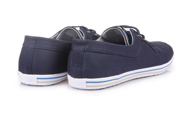 Sporty shoes in sport shoes concept on white