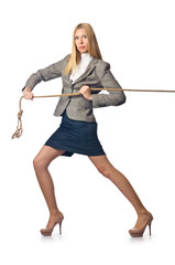 Businesswoman in tug of war concept