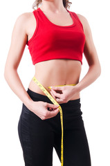 Young girl with centimeter in dieting concept