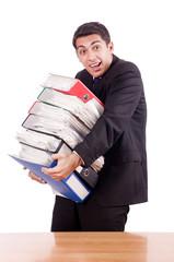 Young busy businessman at his desk