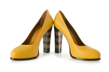 Stylish woman shoes on white in fashion concept