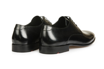 Fashion concept with male shoes on white