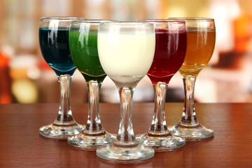 Tasty color liquors, on bright background