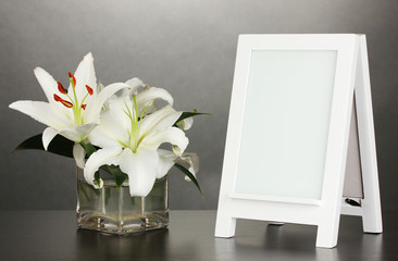 White photo frame for home decoration on grey background