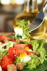 Fresh mixed salad with eggs, tomato, salad leaves and other