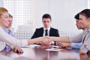 business people making deal at meeting