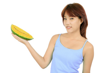 Isolated young asian woman with a piece of yellow watermelon