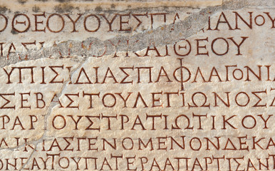 Old greek scriptures in Ephesus Turkey - obrazy, fototapety, plakaty