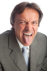 busiinesssman poking his tongue out