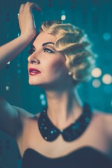 Elegant blond retro woman with beautiful hairdo