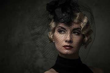 Elegant blond retro woman  with red lipstick