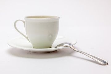 White coffee cup with spoon