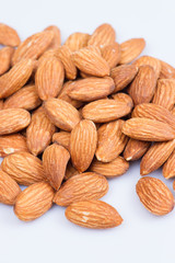 Almonds on white background