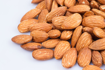 Almonds on white background