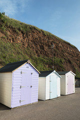 Fototapeta na wymiar Colorful Beach Huts at Seaton, Devon, UK.