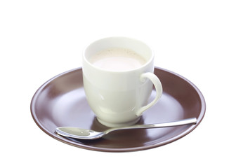 A cup with coffee on a brown saucer