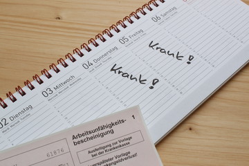 Notiz im Kalender wegen Krankheit