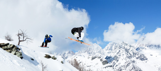 skier vs. snowboarder