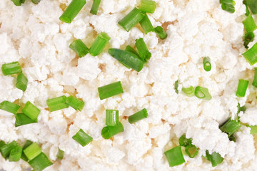 Fresh cottage cheese (curd) in glass bow, isolated on white back