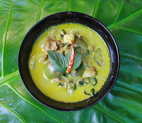 Green pork Curry on green leaf , Thai cuisine